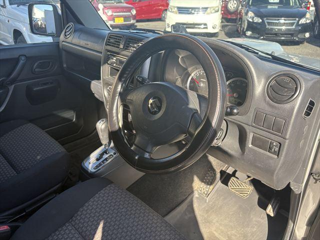 ジムニー ＸＧ　４ＷＤ　ターボ　ＡＴ　オーディオ　ヘットライトレベライザー　パワーウィンドウ　シートヒーター　エアバック　エアコン　社外アルミホイール（26枚目）