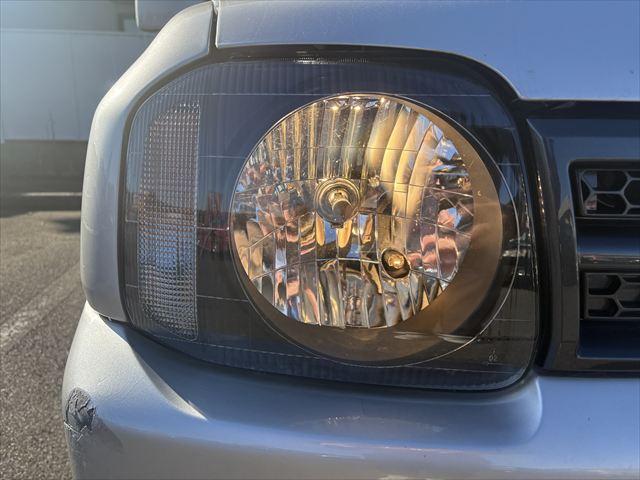 ジムニー ＸＧ　４ＷＤ　ターボ　ＡＴ　オーディオ　ヘットライトレベライザー　パワーウィンドウ　シートヒーター　エアバック　エアコン　社外アルミホイール（34枚目）