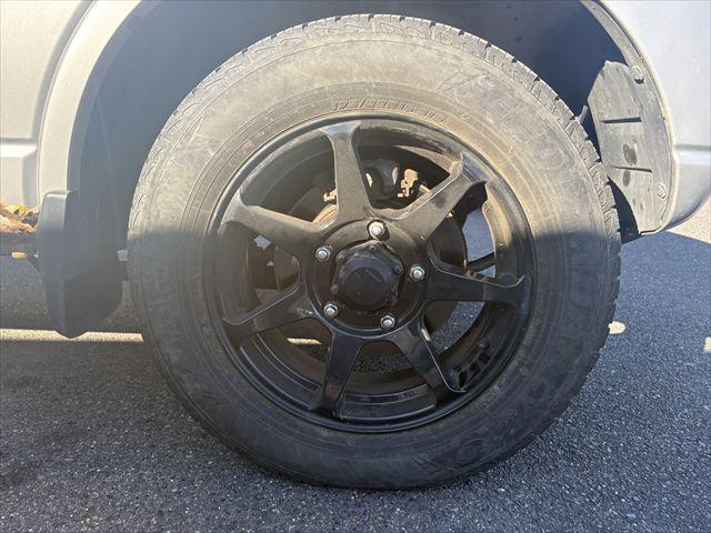 ジムニー ＸＧ　４ＷＤ　ターボ　ＡＴ　オーディオ　ヘットライトレベライザー　パワーウィンドウ　シートヒーター　エアバック　エアコン　社外アルミホイール（46枚目）