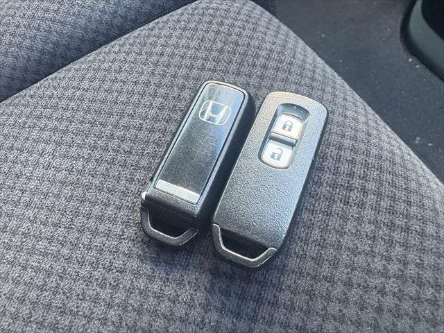 Ｎ－ＯＮＥ Ｇ・Ｌパッケージ　スマートキー２本　プッシュスタート　純正ナビ　ＵＳＢ　ワンセグ　ＣＤ　バックカメラ　ステアリングスイッチ　電動格納ミラー　ＡＵＴＯエアコン　プロジェクターヘッドライト（26枚目）