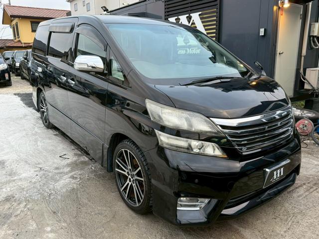 ヴェルファイア 2.4Z プラチナセレクションII タイプゴールド 禁煙車 フリップダウンモニター 両側パワースライドドア デジタルインナーミラー 社外19インチアルミ パワーバックドア 黒革調シートカバー メーカーマルチナビ クリアランスソナー ウッドコンビハンドル(25枚目)