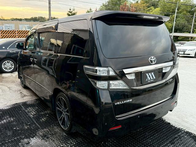 ヴェルファイア 2.4Z プラチナセレクションII タイプゴールド 禁煙車 フリップダウンモニター 両側パワースライドドア デジタルインナーミラー 社外19インチアルミ パワーバックドア 黒革調シートカバー メーカーマルチナビ クリアランスソナー ウッドコンビハンドル(27枚目)