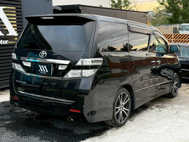 ヴェルファイア 2.4Z プラチナセレクションII タイプゴールド 禁煙車 フリップダウンモニター 両側パワースライドドア デジタルインナーミラー 社外19インチアルミ パワーバックドア 黒革調シートカバー メーカーマルチナビ クリアランスソナー ウッドコンビハンドル(28枚目)
