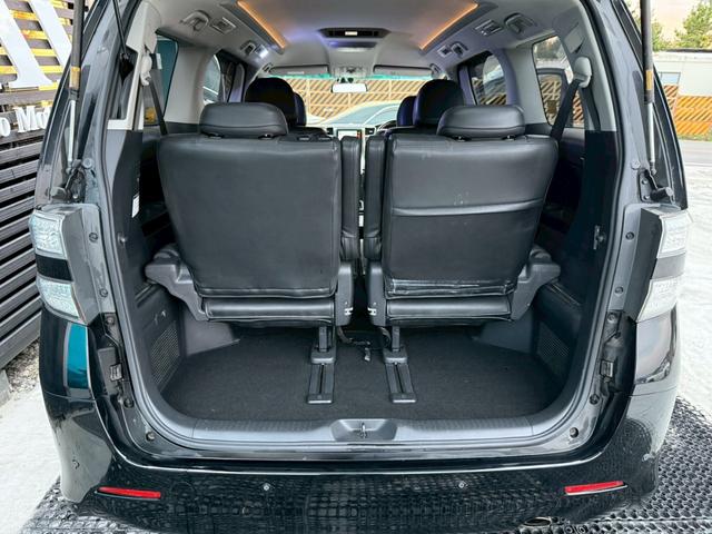 ヴェルファイア 2.4Z プラチナセレクションII タイプゴールド 禁煙車 フリップダウンモニター 両側パワースライドドア デジタルインナーミラー 社外19インチアルミ パワーバックドア 黒革調シートカバー メーカーマルチナビ クリアランスソナー ウッドコンビハンドル(74枚目)