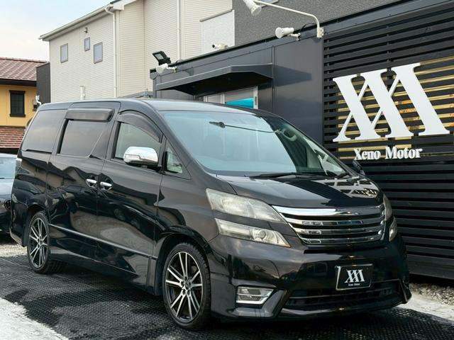 ヴェルファイア 2.4Z プラチナセレクションII タイプゴールド 禁煙車 フリップダウンモニター 両側パワースライドドア デジタルインナーミラー 社外19インチアルミ パワーバックドア 黒革調シートカバー メーカーマルチナビ クリアランスソナー ウッドコンビハンドル(75枚目)