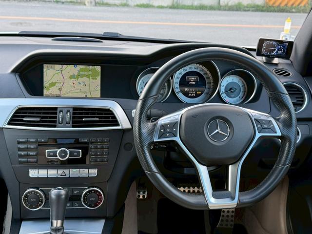 Ｃクラス Ｃ１８０クーペ　禁煙車　白革シート　レーダークルーズコントロール　シートヒーター　シートメモリー　メーカー純正ナビ　バックモニター　フルセグＴＶ　スマートキー　プッシュスタート　クリアランスソナー　ブラインドスポット（52枚目）