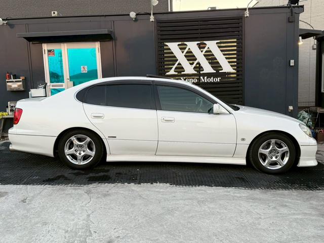 アリスト V300ベルテックスエディション 禁煙車 タイミングベルト交換済 サンルーフ 黒革シート フルエアロ HKS車高調 ブリッツマフラー クスコタワーバー ターボタイマー イカリングヘッド LEDテール 16インチメッキアルミ 純正ナビ(22枚目)