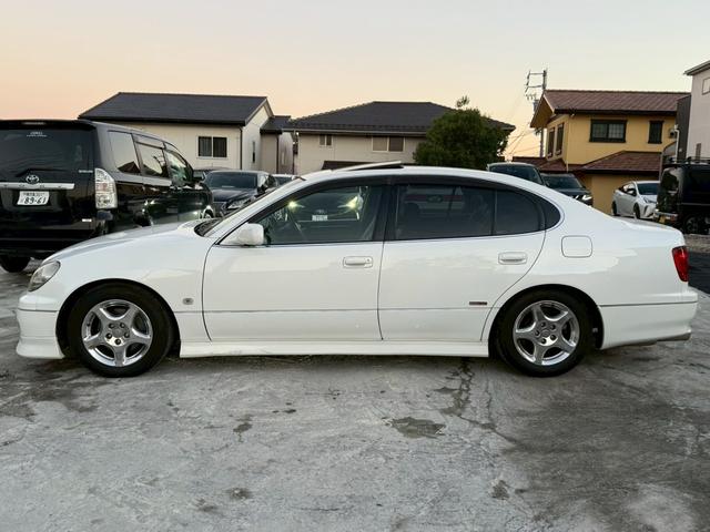 アリスト V300ベルテックスエディション 禁煙車 タイミングベルト交換済 サンルーフ 黒革シート フルエアロ HKS車高調 ブリッツマフラー クスコタワーバー ターボタイマー イカリングヘッド LEDテール 16インチメッキアルミ 純正ナビ(23枚目)