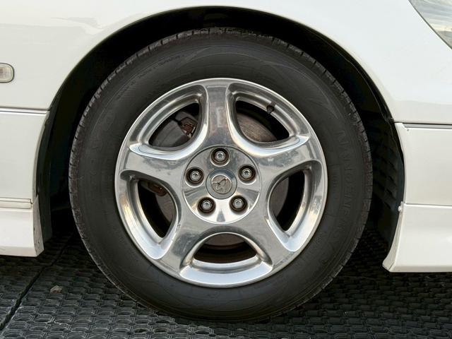 アリスト V300ベルテックスエディション 禁煙車 タイミングベルト交換済 サンルーフ 黒革シート フルエアロ HKS車高調 ブリッツマフラー クスコタワーバー ターボタイマー イカリングヘッド LEDテール 16インチメッキアルミ 純正ナビ(48枚目)