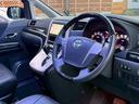 2.4Z プラチナセレクションII タイプゴールド 禁煙車 フリップダウンモニター 両側パワースライドドア デジタルインナーミラー 社外19インチアルミ パワーバックドア 黒革調シートカバー メーカーマルチナビ クリアランスソナー ウッドコンビハンドル(65枚目)