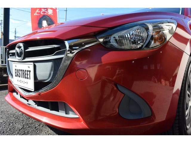 デミオ １３Ｓ　５ＭＴ　純正ナビ　フロアマット　サイドバイザー　プッシュスタート　ステアリングスイッチ（25枚目）