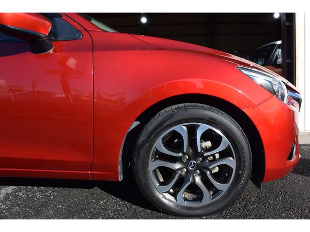 デミオ ＸＤツーリング　禁煙車　純正ナビ　バックカメラ　フルセグＴＶ　ＬＥＤヘッドライト　クルーズコントロール　ＤＶＤ再生　パドルシフト　ブラウンシートカバー　プッシュスタート　フロアマット　サイドバイザー　純正１６ＡＷ（63枚目）