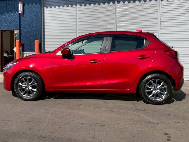 デミオ 13Sツーリング Lパッケージ 純正ナビ CD DVD Bluetooth ETC バックカメラ クルコン 純正15インチアルミ スマートシティブレーキアシスト 車線逸脱防止警報 シートヒーター アイドリングストップ(3枚目)