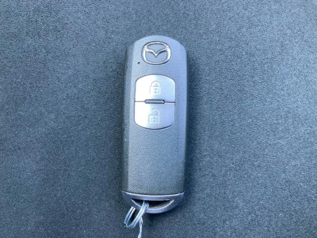 デミオ 13Sツーリング Lパッケージ 純正ナビ CD DVD Bluetooth ETC バックカメラ クルコン 純正15インチアルミ スマートシティブレーキアシスト 車線逸脱防止警報 シートヒーター アイドリングストップ(38枚目)