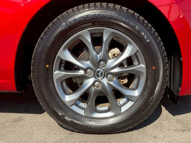 デミオ 13Sツーリング Lパッケージ 純正ナビ CD DVD Bluetooth ETC バックカメラ クルコン 純正15インチアルミ スマートシティブレーキアシスト 車線逸脱防止警報 シートヒーター アイドリングストップ(40枚目)