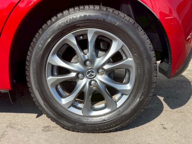 デミオ 13Sツーリング Lパッケージ 純正ナビ CD DVD Bluetooth ETC バックカメラ クルコン 純正15インチアルミ スマートシティブレーキアシスト 車線逸脱防止警報 シートヒーター アイドリングストップ(41枚目)