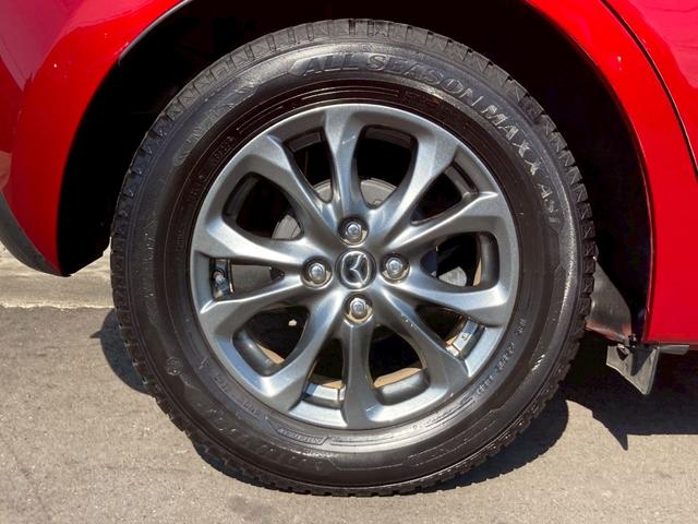 デミオ 13Sツーリング Lパッケージ 純正ナビ CD DVD Bluetooth ETC バックカメラ クルコン 純正15インチアルミ スマートシティブレーキアシスト 車線逸脱防止警報 シートヒーター アイドリングストップ(43枚目)