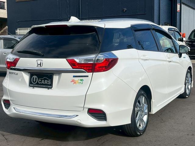シャトル ハイブリッド 純正ナビ ワンセグTV CD DVD Bluetooth バックカメラ ETC ドラレコ ホンダセンシング 半革シート シートヒーター 純正16インチアルミ LEDライト アイドリングストップ(2枚目)