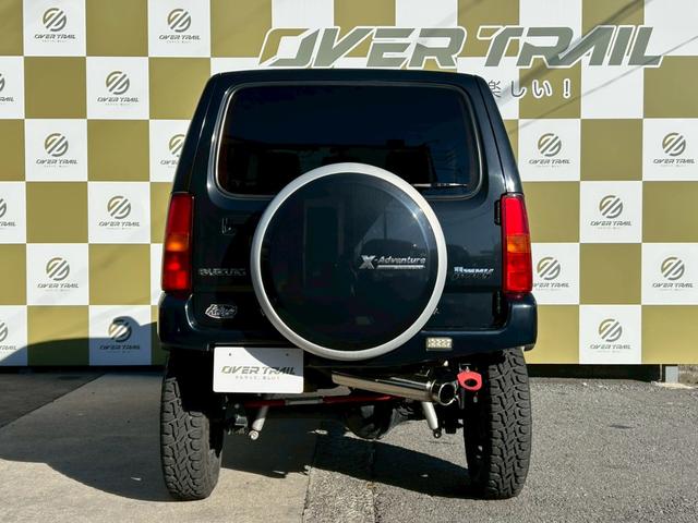 ジムニー クロスアドベンチャー　５速ＭＴ　４ＷＤ　Ｐ－ナビ　ＴＡＮＩＧＵＣＨＩソルブ３インチＵＰ　ＭＲＳ製インテークチャンバー　ＭＲＳ製エアクリ　ＦＵＪＩＴＳＵＢＯ－ＡＫマフラー　ラノーズエアＢプレート　ＯＰＥＮＣＯＵＮＴＲＹ（3枚目）