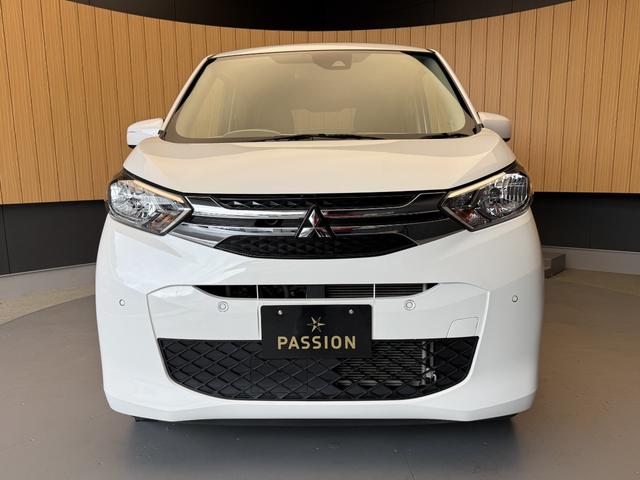 ｅＫワゴン Ｍ　車検２年　衝突被害軽減ブレーキ　コーナーセンサー　キーレスエントリー　シートヒーター　パナソニックナビ　電動格納ドアミラー　ＥＴＣ　アイドリングストップ　マニュアルエアコン　パワーウインドウ（6枚目）