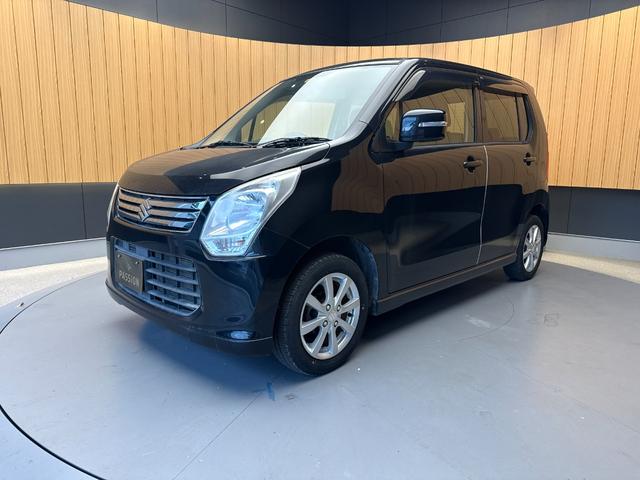 ワゴンＲ ＦＸリミテッド　車検２年　アイドリングストップ　ケンウッドナビ　電動格納ドアミラー　セキュリティアラーム　スマートキー　アルミホイール　ベンチシート　オートエアコン　パワーウインドウ　軽自動車　保証あり（5枚目）