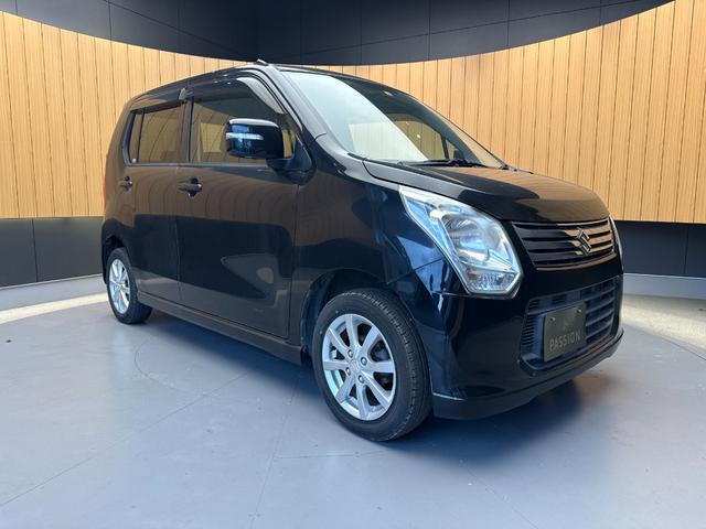 ワゴンＲ ＦＸリミテッド　車検２年　アイドリングストップ　ケンウッドナビ　電動格納ドアミラー　セキュリティアラーム　スマートキー　アルミホイール　ベンチシート　オートエアコン　パワーウインドウ　軽自動車　保証あり（7枚目）