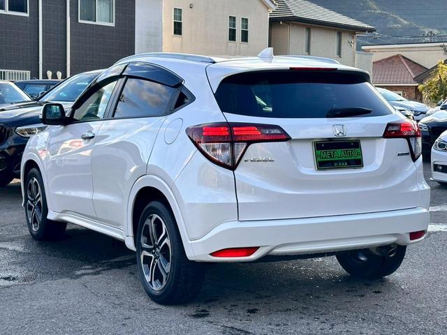 ヴェゼル ハイブリッドＺ　禁煙　ワンオーナー　ユーザー様買取車両　ハーフレザー　衝突被害軽減ブレーキ　クルーズコントロール　シートヒーター　パドルシフト　ブレーキホールド　スマートキー　バックカメラ　ＬＥＤヘッド　フルセグ（20枚目）