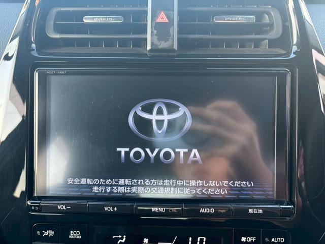 プリウス Ａツーリングセレクション　禁煙車　モデリスタフルエアロ　純正９インチナビ　黒革シート　Ｂｌｕｅｔｏｏｔｈ　バックカメラ　レーダークルーズコントロール　ブラインドスポットモニター　ＥＴＣ　シートヒーター　純正ツーリング１７ＡＷ（4枚目）