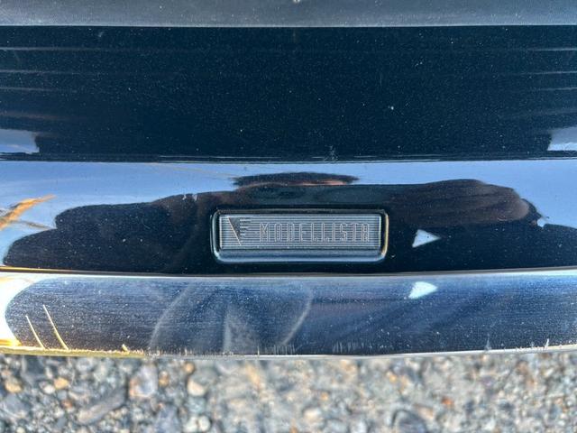 プリウス Ｓツーリングセレクション　禁煙　後期型　黒革　モデリスタフルエアロ　純正９インチナビ　２本出しマフラー　社外１８インチＡＷ　バックカメラ　Ｂｌｕｅｔｏｏｔｈ　ＡＣ１００Ｖ　シートヒーター　レーダークルーズコントロール　ＥＴＣ（6枚目）