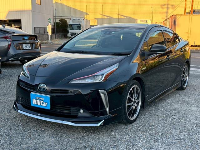 プリウス Ｓツーリングセレクション　禁煙　後期型　黒革　モデリスタフルエアロ　純正９インチナビ　２本出しマフラー　社外１８インチＡＷ　バックカメラ　Ｂｌｕｅｔｏｏｔｈ　ＡＣ１００Ｖ　シートヒーター　レーダークルーズコントロール　ＥＴＣ（17枚目）