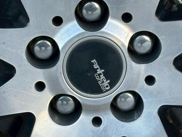 プリウス Ｓツーリングセレクション　禁煙　後期型　黒革　モデリスタフルエアロ　純正９インチナビ　２本出しマフラー　社外１８インチＡＷ　バックカメラ　Ｂｌｕｅｔｏｏｔｈ　ＡＣ１００Ｖ　シートヒーター　レーダークルーズコントロール　ＥＴＣ（27枚目）