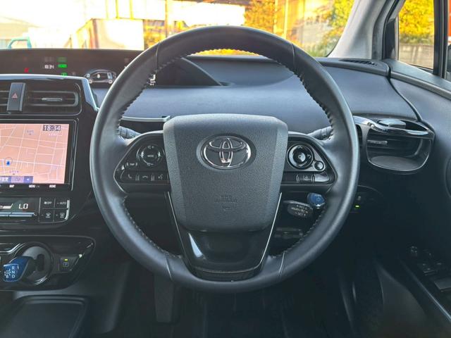 プリウス Ｓツーリングセレクション　禁煙　後期型　黒革　モデリスタフルエアロ　純正９インチナビ　２本出しマフラー　社外１８インチＡＷ　バックカメラ　Ｂｌｕｅｔｏｏｔｈ　ＡＣ１００Ｖ　シートヒーター　レーダークルーズコントロール　ＥＴＣ（35枚目）