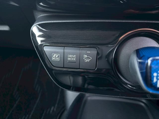 プリウス Ｓツーリングセレクション　禁煙　後期型　黒革　モデリスタフルエアロ　純正９インチナビ　２本出しマフラー　社外１８インチＡＷ　バックカメラ　Ｂｌｕｅｔｏｏｔｈ　ＡＣ１００Ｖ　シートヒーター　レーダークルーズコントロール　ＥＴＣ（52枚目）