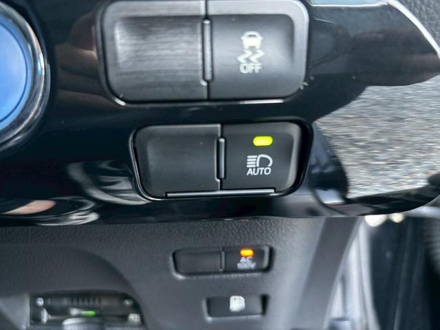 プリウス Ｓツーリングセレクション　禁煙　後期型　黒革　モデリスタフルエアロ　純正９インチナビ　２本出しマフラー　社外１８インチＡＷ　バックカメラ　Ｂｌｕｅｔｏｏｔｈ　ＡＣ１００Ｖ　シートヒーター　レーダークルーズコントロール　ＥＴＣ（54枚目）