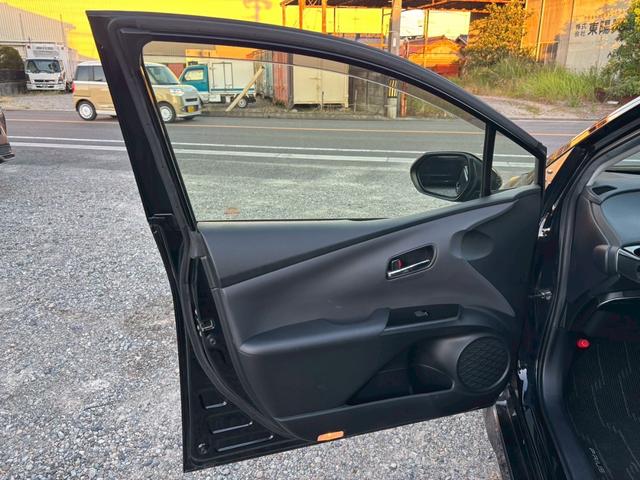 プリウス Ｓツーリングセレクション　禁煙　後期型　黒革　モデリスタフルエアロ　純正９インチナビ　２本出しマフラー　社外１８インチＡＷ　バックカメラ　Ｂｌｕｅｔｏｏｔｈ　ＡＣ１００Ｖ　シートヒーター　レーダークルーズコントロール　ＥＴＣ（61枚目）