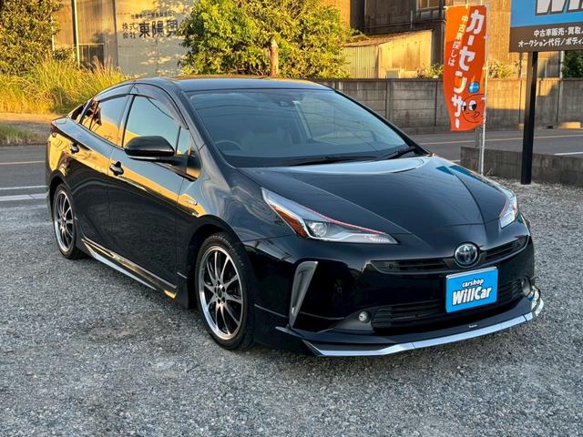 プリウス Ｓツーリングセレクション　禁煙　後期型　黒革　モデリスタフルエアロ　純正９インチナビ　２本出しマフラー　社外１８インチＡＷ　バックカメラ　Ｂｌｕｅｔｏｏｔｈ　ＡＣ１００Ｖ　シートヒーター　レーダークルーズコントロール　ＥＴＣ（70枚目）