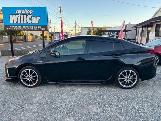 プリウス Ｓツーリングセレクション　禁煙　後期型　黒革　モデリスタフルエアロ　純正９インチナビ　２本出しマフラー　社外１８インチＡＷ　バックカメラ　Ｂｌｕｅｔｏｏｔｈ　ＡＣ１００Ｖ　シートヒーター　レーダークルーズコントロール　ＥＴＣ（72枚目）