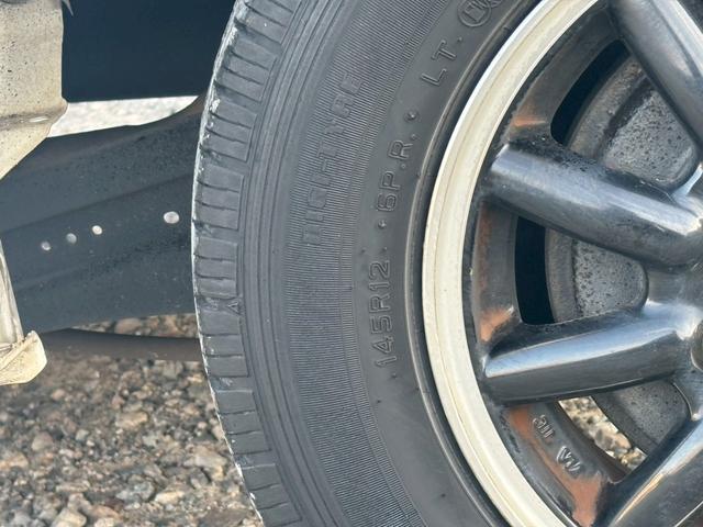 エブリイ ジョインターボ　黒ナンバー登録可　禁煙車　ターボ　社外ナビ　ＴＶ　ＣＤ　ＤＶＤ　ＥＴＣ　キーレス　パワーウィンドウ　電動格納ミラー　エアコン　シートカバー　ハイルーフ　スペアタイヤ　ＡＢＳ　オートマ　衝突安全ボディー（22枚目）