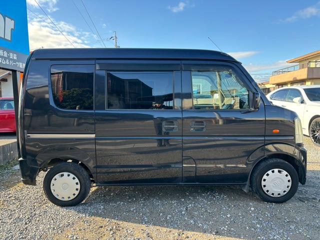 エブリイ ジョインターボ　黒ナンバー登録可　禁煙車　ターボ　社外ナビ　ＴＶ　ＣＤ　ＤＶＤ　ＥＴＣ　キーレス　パワーウィンドウ　電動格納ミラー　エアコン　シートカバー　ハイルーフ　スペアタイヤ　ＡＢＳ　オートマ　衝突安全ボディー（69枚目）
