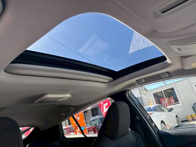 プリウス A 禁煙車 サンルーフ モデリスタフルエアロ 純正9インチナビ Bluetooth ブラインドスポットモニター ETC ドライブレコーダー HDMIポート AC100V レーダークルーズコントロール(6枚目)