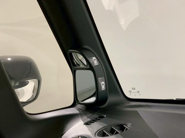 Ｎ－ＢＯＸカスタム Ｇ・Ａパッケージ　ワンセグＴＶ　ＨＩＤ　ナビ　追突被害軽減ブレーキ　ｉストップ　サイドＳＲＳ　運転席エアバッグ　横滑り防止装置付き　パワーウインドウ　キーレス　盗難防止システム　禁煙車　スマートキープッシュスタート（8枚目）