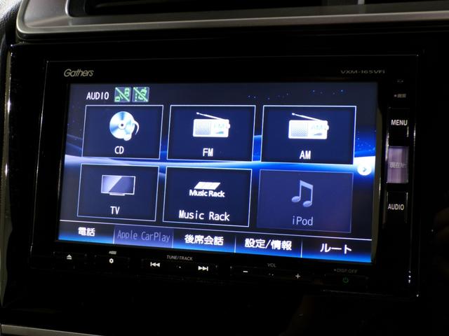 フィット １３Ｇ・Ｆパッケージコンフォートエディション　Ｂｌｕｅｔｏｏｔｈ接続ドラレコＥＴＣフルセグＴＶスマートキー　リヤビューカメラ　ＤＶＤ再生　シ－トヒ－タ－　ＶＳＡ　地デジフルセグ　ＡＵＴＯエアコン　キーレスエントリー　ＡＢＳ　エアバッグ　禁煙車（7枚目）