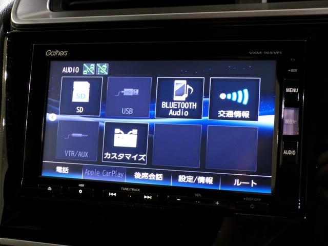 フィット １３Ｇ・Ｆパッケージコンフォートエディション　Ｂｌｕｅｔｏｏｔｈ接続ドラレコＥＴＣフルセグＴＶスマートキー　リヤビューカメラ　ＤＶＤ再生　シ－トヒ－タ－　ＶＳＡ　地デジフルセグ　ＡＵＴＯエアコン　キーレスエントリー　ＡＢＳ　エアバッグ　禁煙車（8枚目）