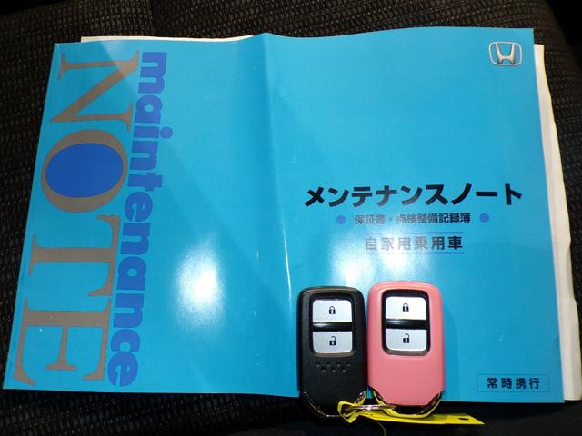 フィット １３Ｇ・Ｆパッケージコンフォートエディション　Ｂｌｕｅｔｏｏｔｈ接続ドラレコＥＴＣフルセグＴＶスマートキー　リヤビューカメラ　ＤＶＤ再生　シ－トヒ－タ－　ＶＳＡ　地デジフルセグ　ＡＵＴＯエアコン　キーレスエントリー　ＡＢＳ　エアバッグ　禁煙車（28枚目）