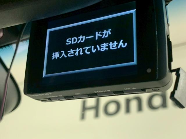 フィット 13G・F 前側ドラレコ メモリ-ナビ フルセグTV LEDヘッドライト 5MT リヤカメラ アクティブクルーズ 衝突被害軽減 地デジ 禁煙 イモビライザー 助手席エアバック キーレス AAC パワーウィンドー(9枚目)