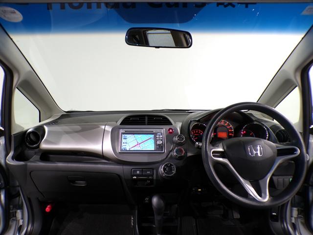 フィット G・10thアニバーサリー ETCインターナビワンセグTVスマートキー 盗難防止システム DVD再生 TVナビ エアコン 運転席エアバッグ Wエアバッグ ABS パワーウィンドウ キーレスエントリー パワーステアリング 禁煙(22枚目)