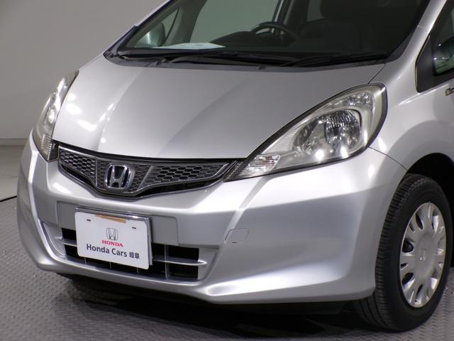 フィット G・10thアニバーサリー ETCインターナビワンセグTVスマートキー 盗難防止システム DVD再生 TVナビ エアコン 運転席エアバッグ Wエアバッグ ABS パワーウィンドウ キーレスエントリー パワーステアリング 禁煙(42枚目)