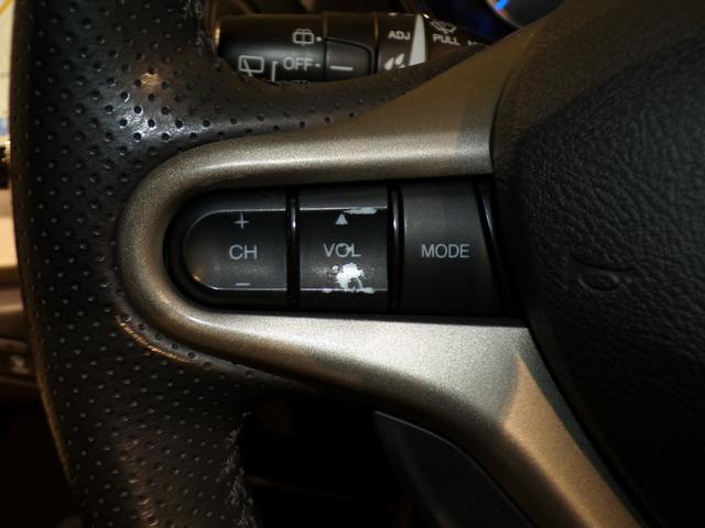 フィットハイブリッド スマートセレクション　Ｂｌｕｅｔｏｏｔｈ接続ＥＴＣフルセグＴＶ社外アルミホイール　エコモード　禁煙　地デジＴＶ　スマートキー　オートクルーズコントロール　イモビ　キーフリー　オートエアコン　ＡＢＳ　パワーウィンドウ　ＶＳＡ（11枚目）