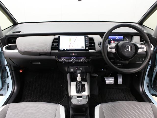 フィット e:HEVクロスター 純正9型ナビ 前後ドラレコ パーキングセンサー 渋滞追従クルーズ 電子パーキング ブレーキホールド オートハイビーム 1オーナー 禁煙 急速充電USB 純正16AW Bluetooth 車線維持支援(5枚目)