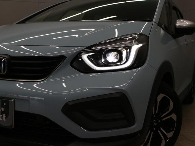 フィット e:HEVクロスター 純正9型ナビ 前後ドラレコ パーキングセンサー 渋滞追従クルーズ 電子パーキング ブレーキホールド オートハイビーム 1オーナー 禁煙 急速充電USB 純正16AW Bluetooth 車線維持支援(18枚目)